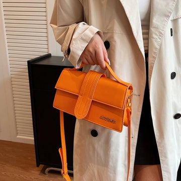 J-A-C-Q-U-E-M-U-S LE BAMBINO WITH OG BOX DUST BAG & SLING BELT PREMIUM (ORANGE)