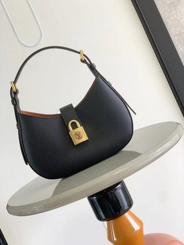 LOU-IS VU-IT-TON LOW KEY SHOULDER BAG