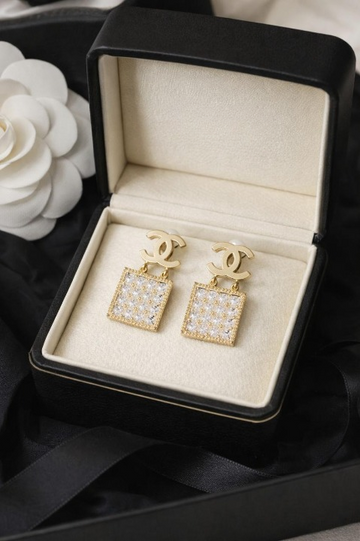 Elevate your style Cha-nel-inspired luxury earring