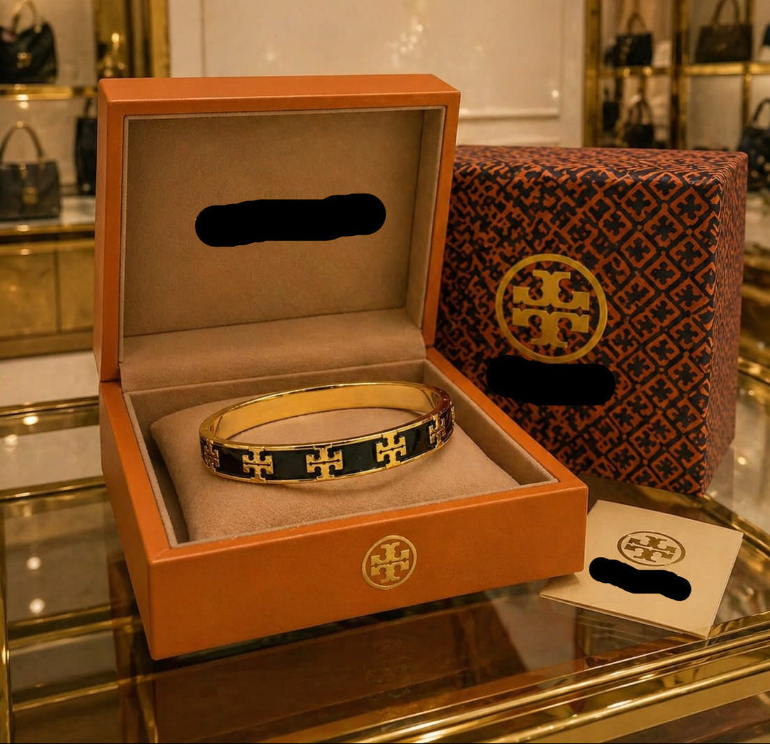 To-ry Bu-rch Bracelet Gold & Black Bracelet