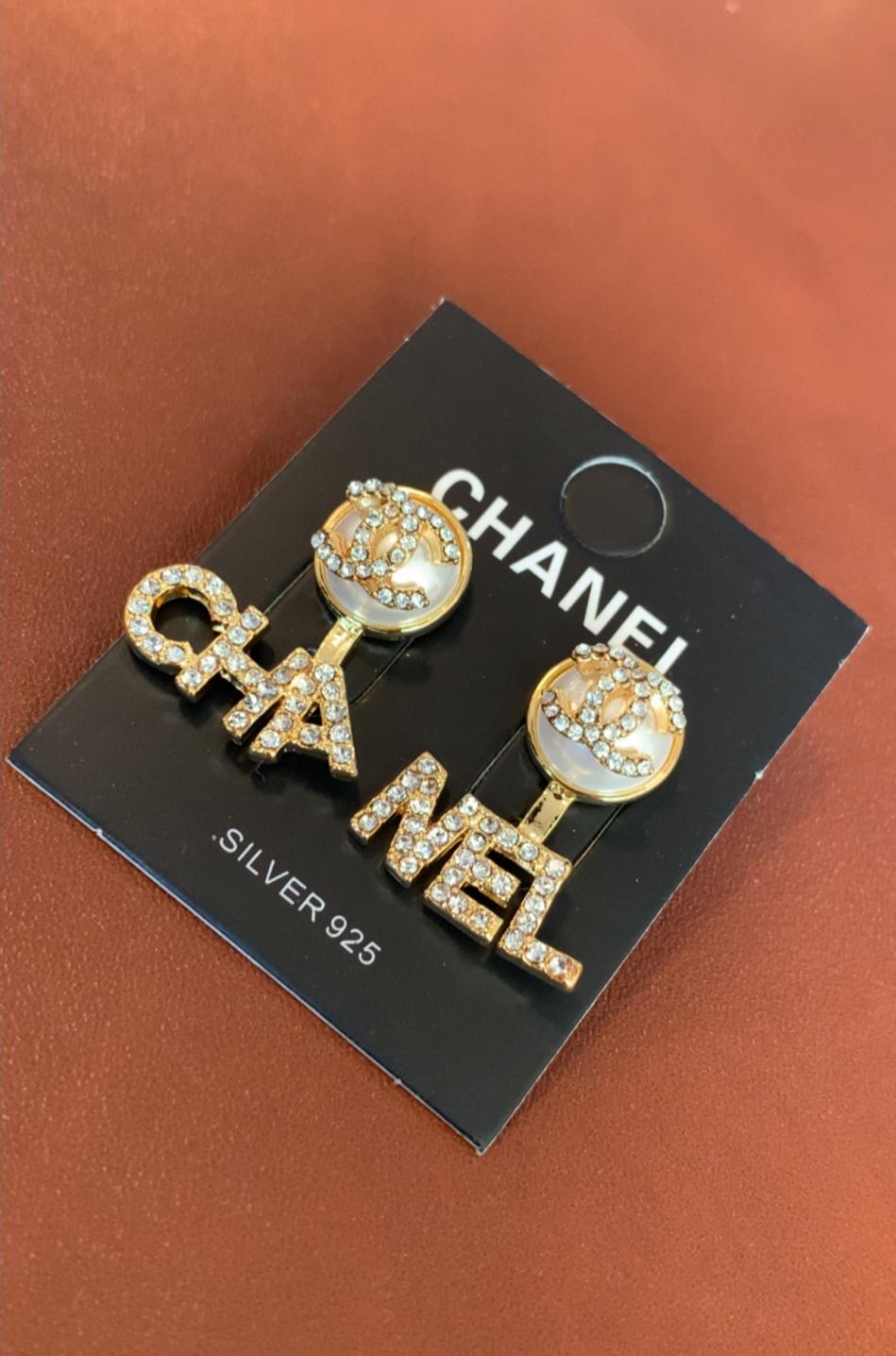 Cha-nel Elevate your style with timeless luxury earrings