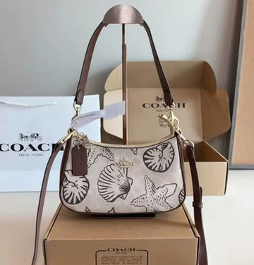 CO-A-CH TERI SHELL SHOULDER BAG