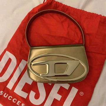 D-I-E-S-E-L METALLIC CHROME SHOULDER BAG